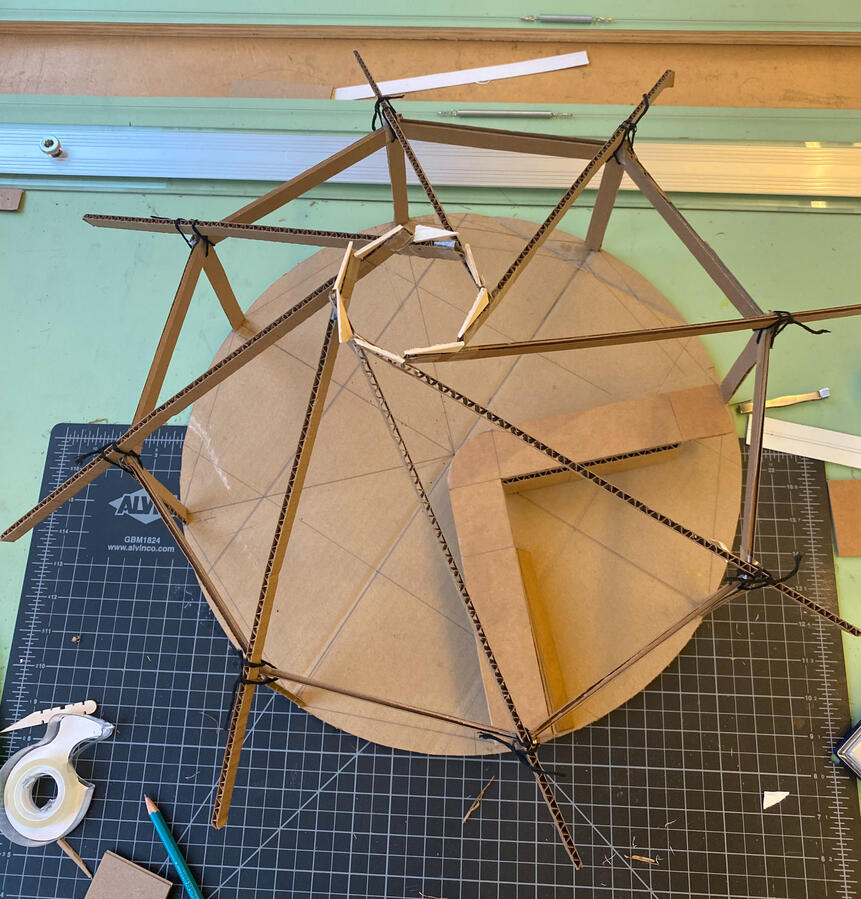 Second iteration of reciprocal roof before the final model, I had figured out how to get the support beams to stand against the other to be self supporting.